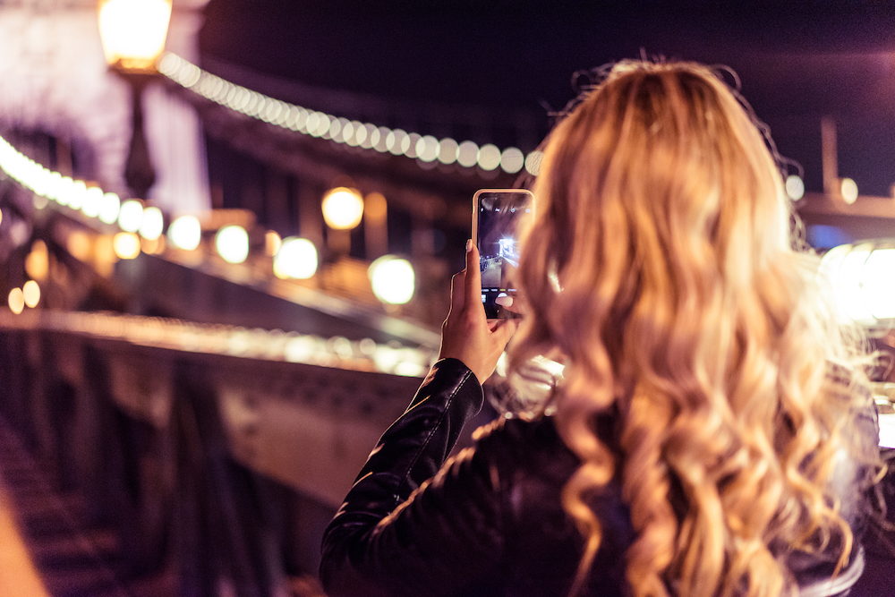 Blonde Woman Taking A Photo Of An Old Bridge At Night Picjumbo Com 2