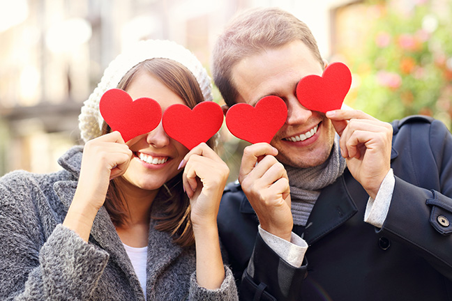 Picture Of Happy Couple Covering Eyes With Hearts; Shutterstock ID 502740214; CUID: 030250; Organization Name: Fort Worth Community CU; Usage (Sales, Marketing, Internal, Other): Marketing